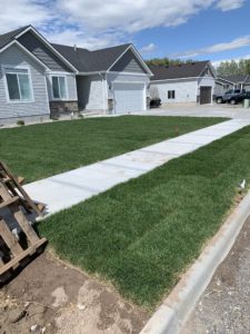 A new home with a new sod lawn.